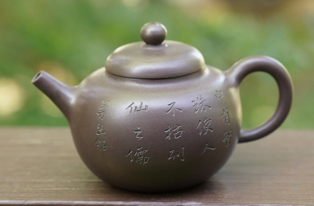 http://www.meimeitea.com/cdn/shop/files/tea-ware-artisan-yixing-zisha-purple-clay-teapot-buddhist-guo-yuan-184.jpg?v=1694881524