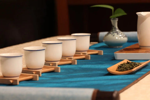 a close up of a coffee cup sitting on top of a wooden table