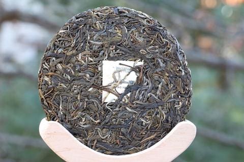 Sheng pu-erh tea cake by meimei fine teas